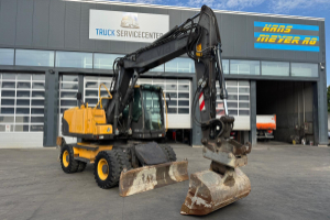 baumaschine_-_ew140_c_2x_schaufeln_oilquick_-_volvo_295174.jpg