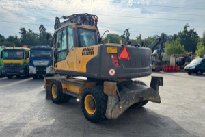 baumaschine_-_ew140_c_2x_schaufeln_oilquick_-_volvo_295178.jpg