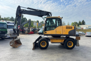 baumaschine_-_ew140_c_2x_schaufeln_oilquick_-_volvo_295179.jpg
