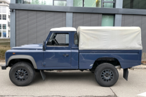 lieferwagen_und_transporter_-_defender_110_2_4_td4_high_capacity_pick_up_mit_blache_-_land_rover_246457.jpg