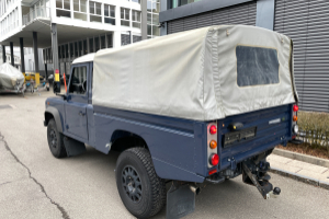 lieferwagen_und_transporter_-_defender_110_2_4_td4_high_capacity_pick_up_mit_blache_-_land_rover_246458.jpg