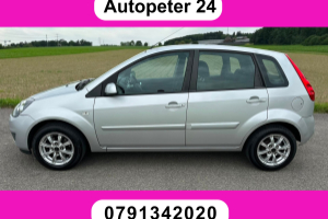 lieferwagen_und_transporter_-_ford_fiesta_1_4_16v_ghia_-_ford_293685.jpg